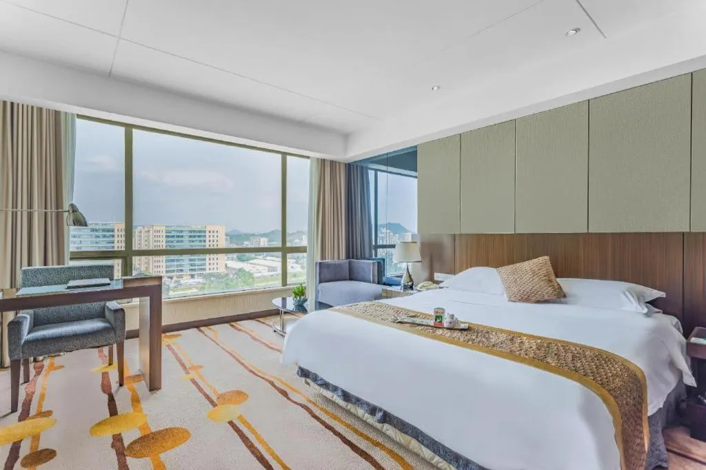 Bed in Santavan Hotel Shenzhen Guangming