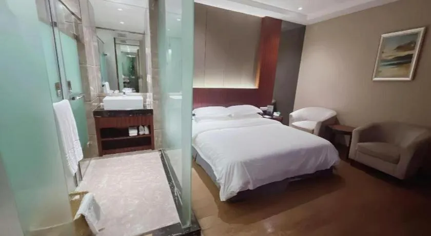 Bed in Santavan Hotel Shenzhen Guangming