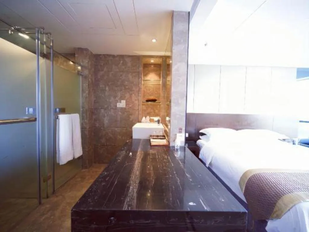 Bed in Santavan Hotel Shenzhen Guangming