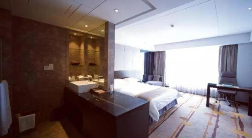 Bed in Santavan Hotel Shenzhen Guangming