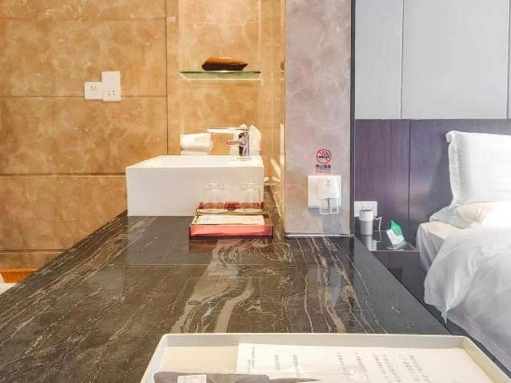 Bed in Santavan Hotel Shenzhen Guangming