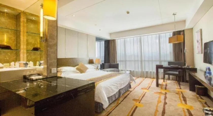 Bed in Santavan Hotel Shenzhen Guangming