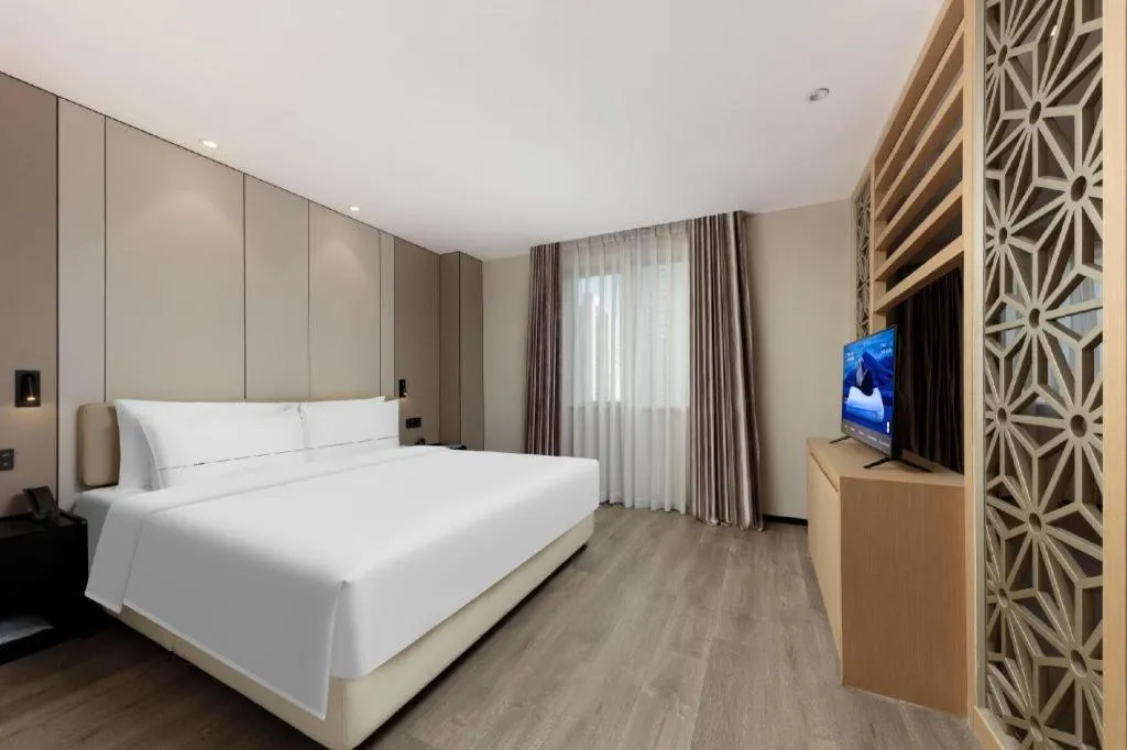 Bed in Atour Hotel Xiamen City Government Dongdu Passenger Transport Terminal