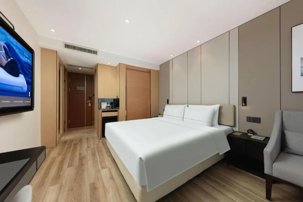 Bed in Atour Hotel Xiamen City Government Dongdu Passenger Transport Terminal