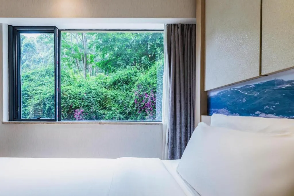 Bed in Atour Hotel Xiamen City Government Dongdu Passenger Transport Terminal