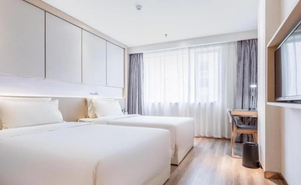 Bed in Atour Hotel Xiamen City Government Dongdu Passenger Transport Terminal