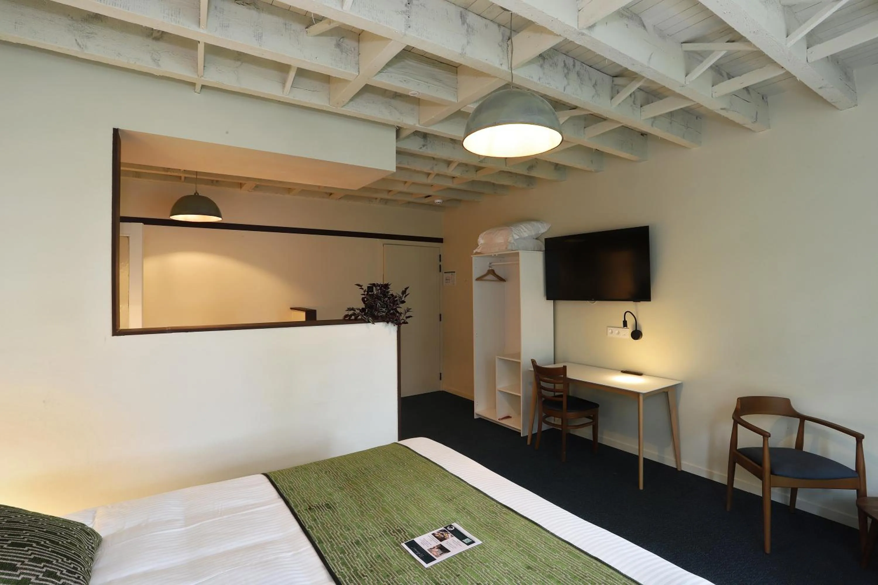 Seating area, Bed in Aparthotel Acacia