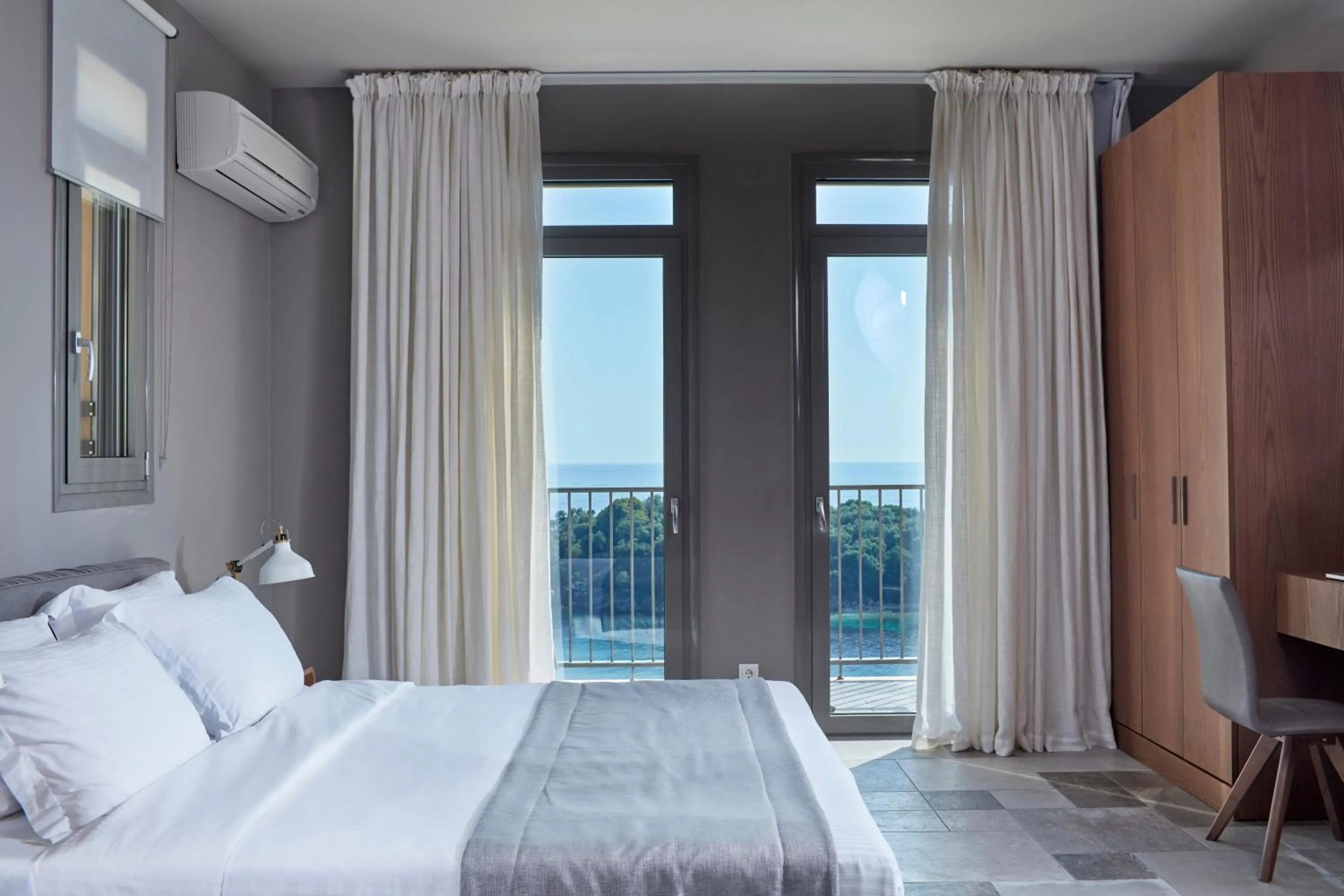 Bed in Sivota Seascape Luxury Villas & Residences