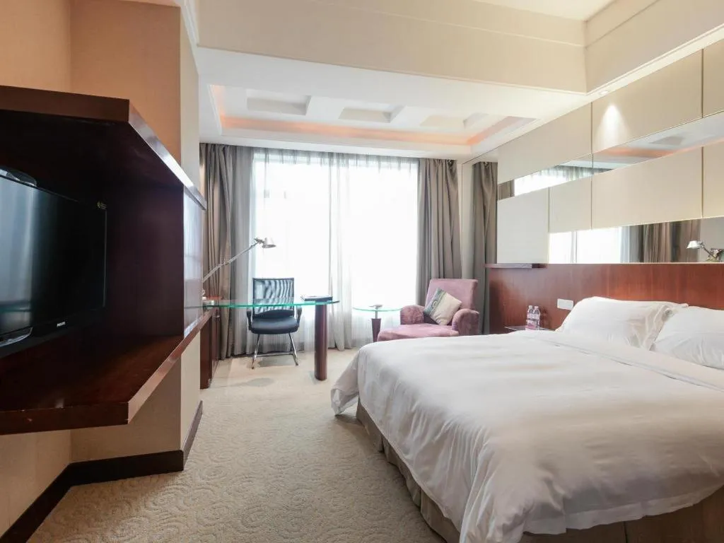 Bed in CP Peninsula Hotel