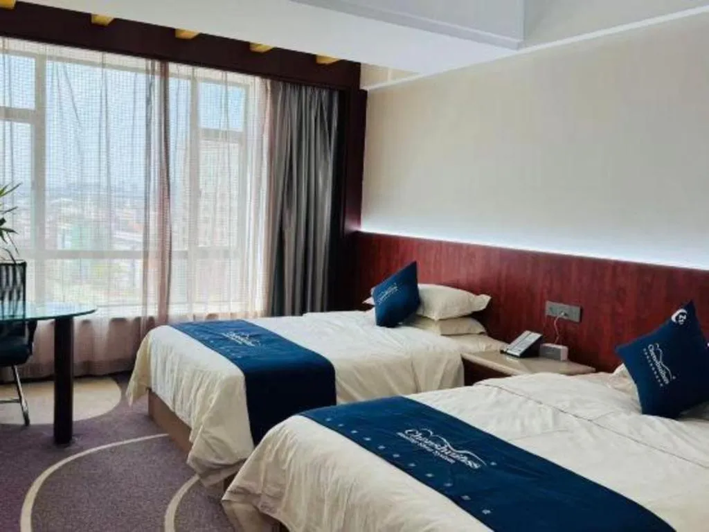 Bed in CP Peninsula Hotel