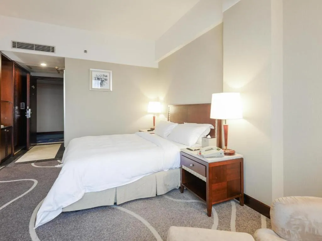 Bed in CP Peninsula Hotel