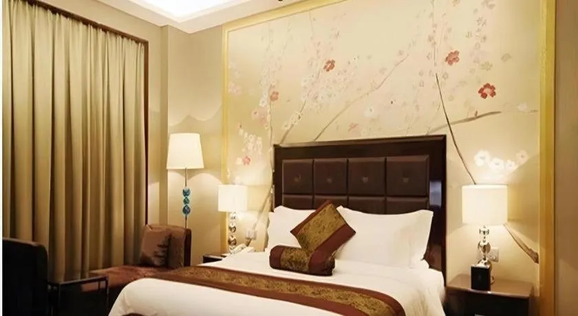 Bed in Yihao International Hotel