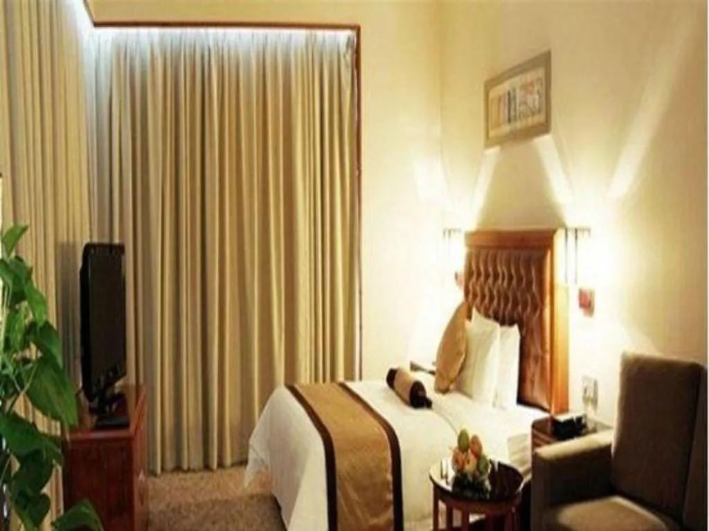 Bed in Yihao International Hotel