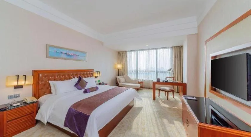 Bed in Yihao International Hotel