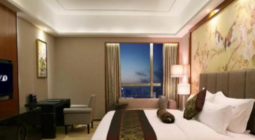 Bed in Yihao International Hotel