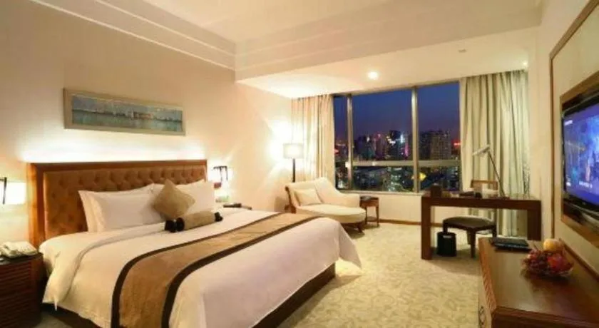 Bed in Yihao International Hotel
