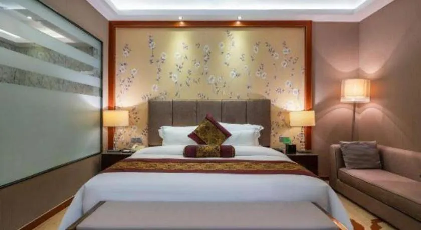 Bed in Yihao International Hotel