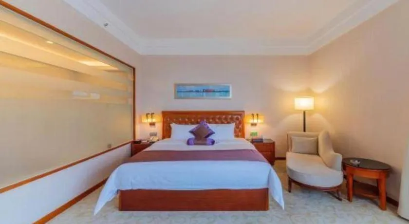 Bed in Yihao International Hotel