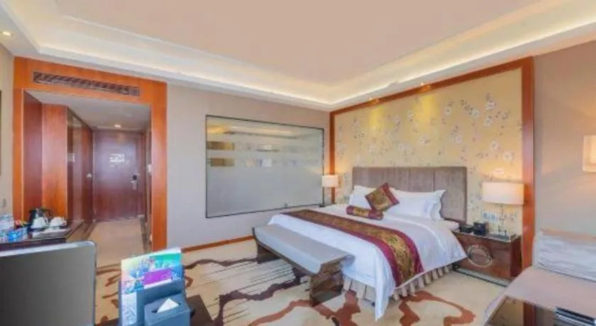 Bed in Yihao International Hotel