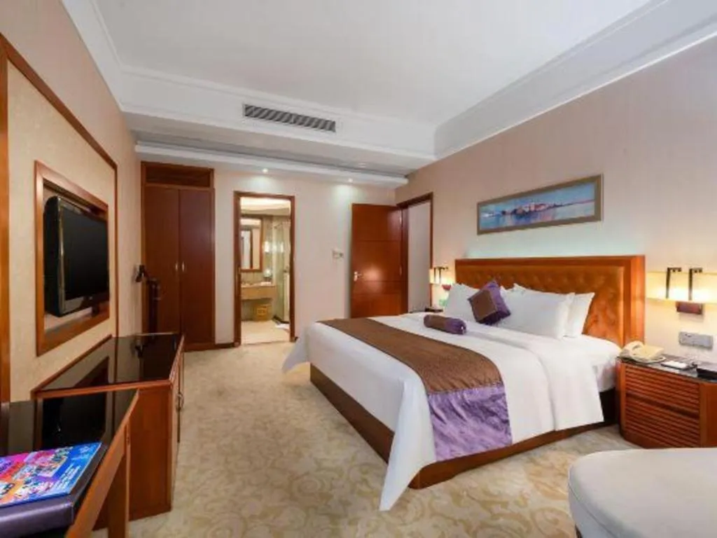 Bed in Yihao International Hotel
