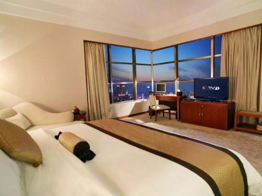 Bed in Yihao International Hotel