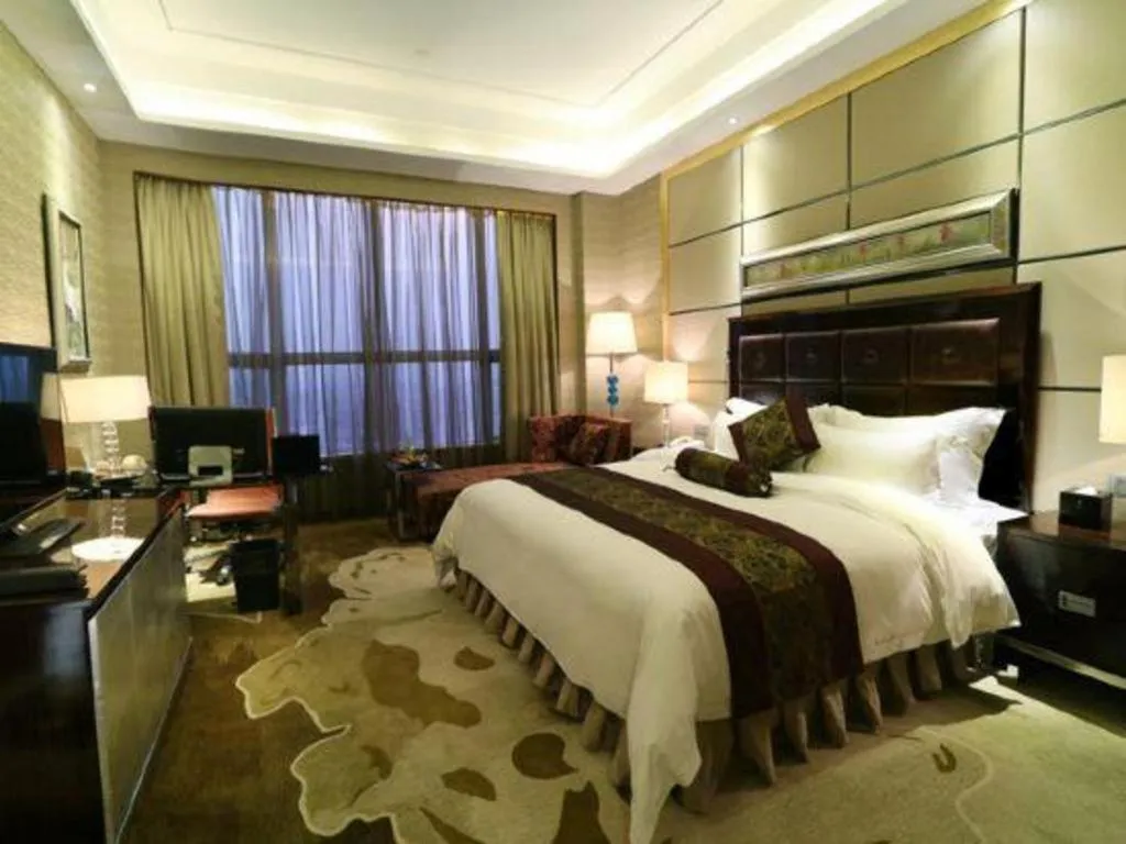 Bed in Yihao International Hotel