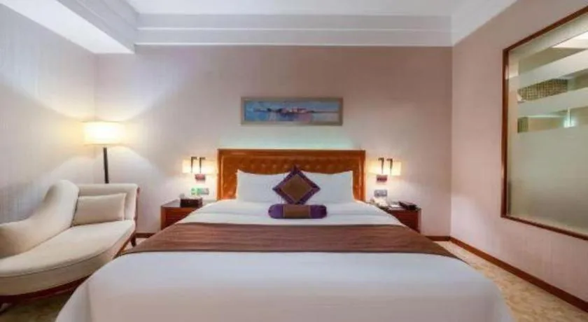 Bed in Yihao International Hotel