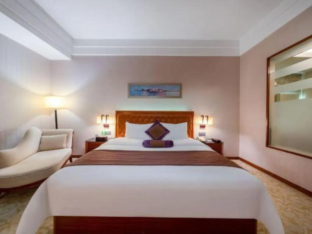 Bed in Yihao International Hotel