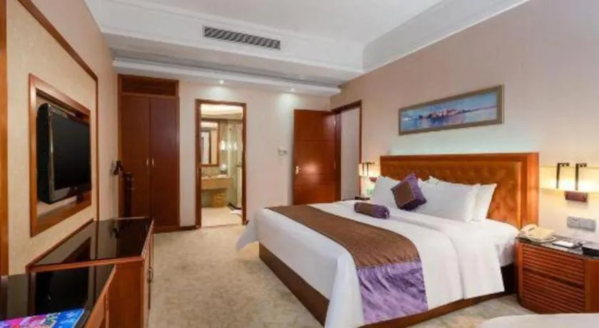 Bed in Yihao International Hotel