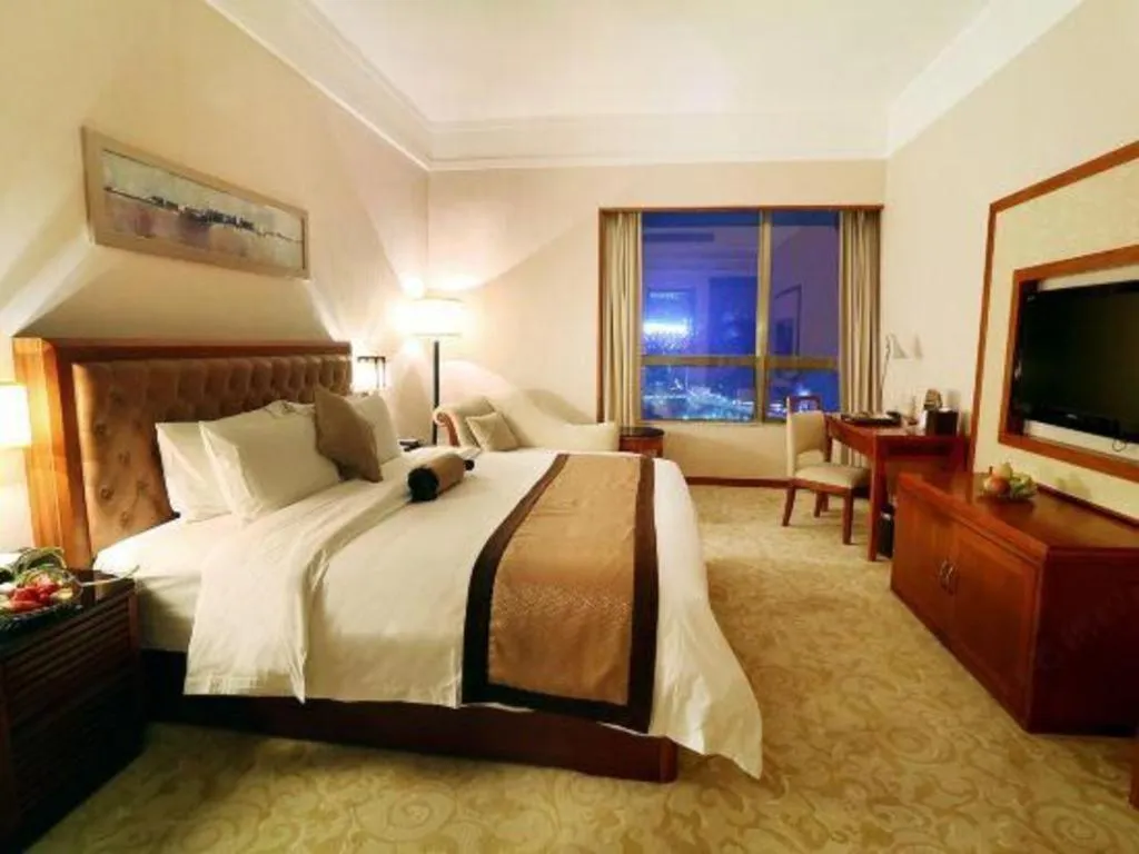 Bed in Yihao International Hotel