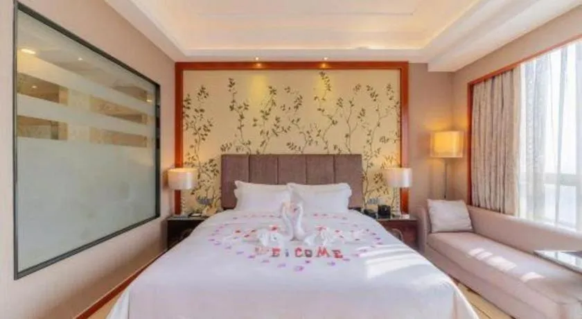 Bed in Yihao International Hotel