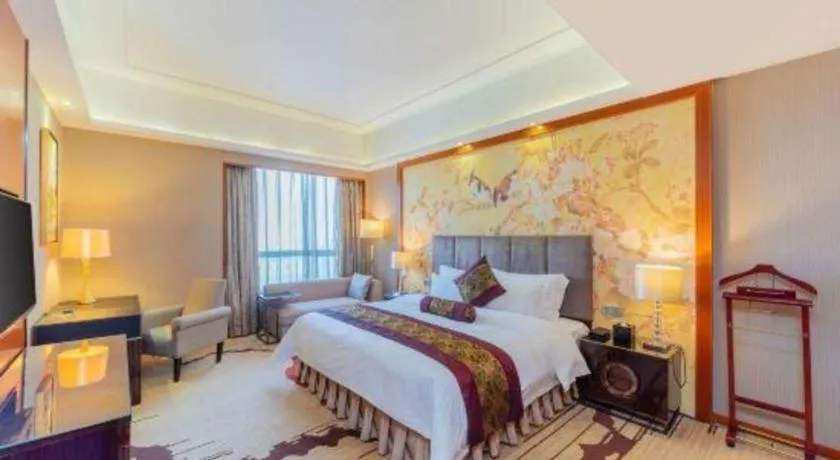 Bed in Yihao International Hotel