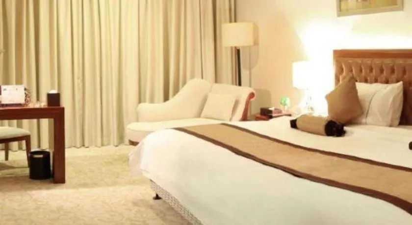 Bed in Yihao International Hotel