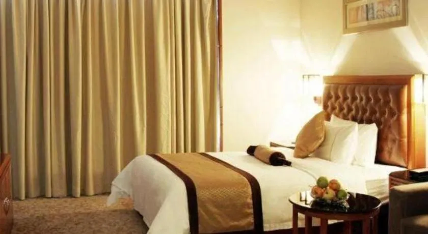 Bed in Yihao International Hotel