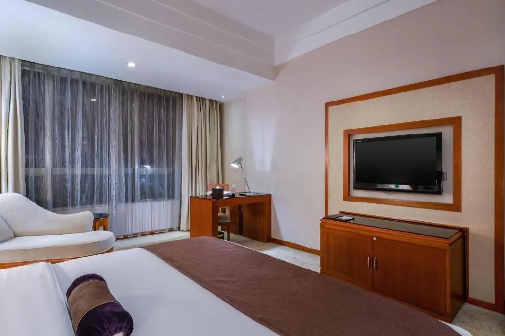 Bed in Yihao International Hotel