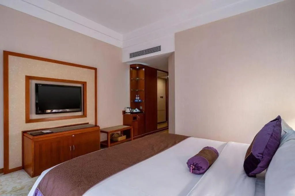 Bed in Yihao International Hotel