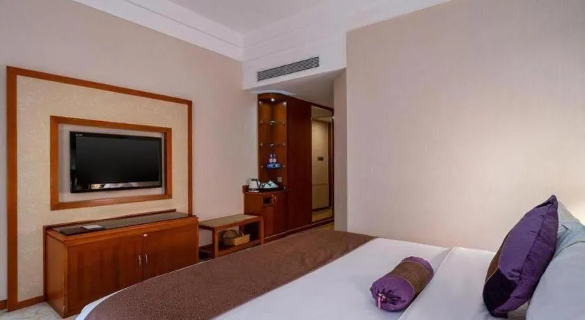 Bed in Yihao International Hotel