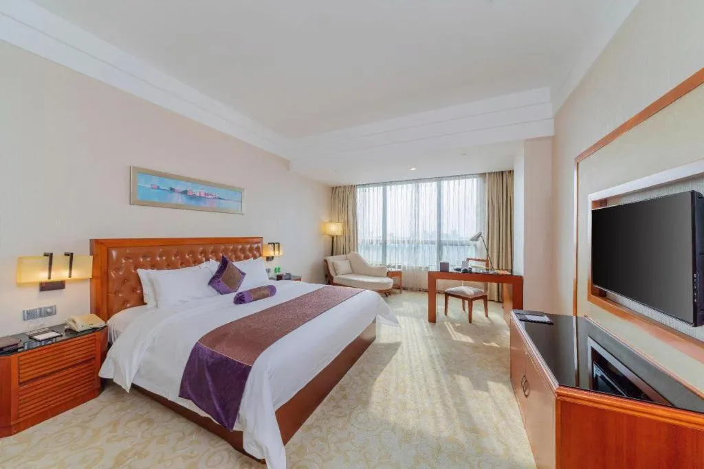 Bed in Yihao International Hotel