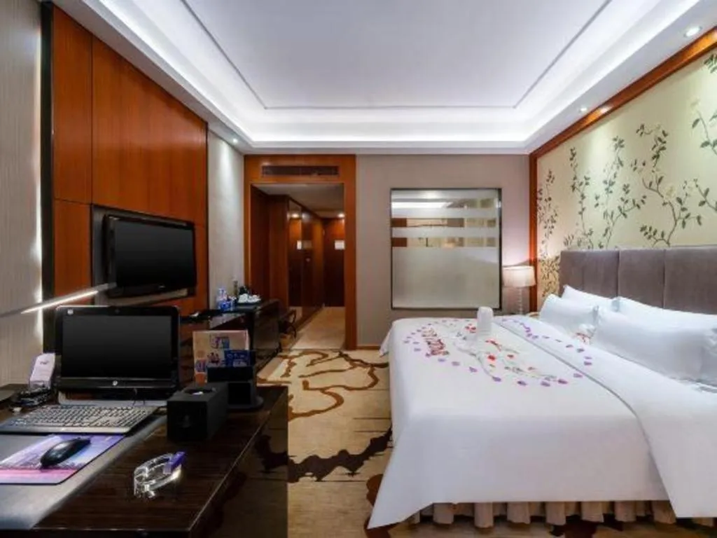 Bed in Yihao International Hotel