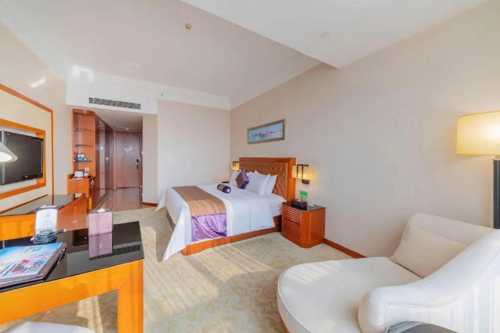 Bed in Yihao International Hotel