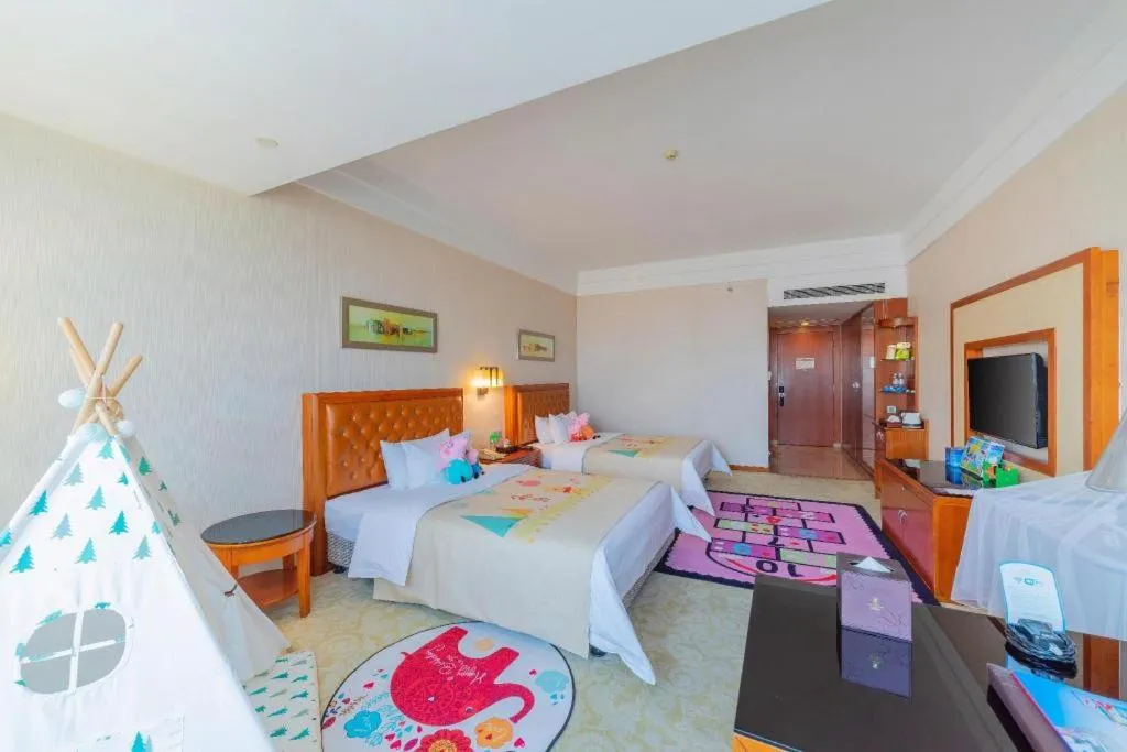 Bed in Yihao International Hotel