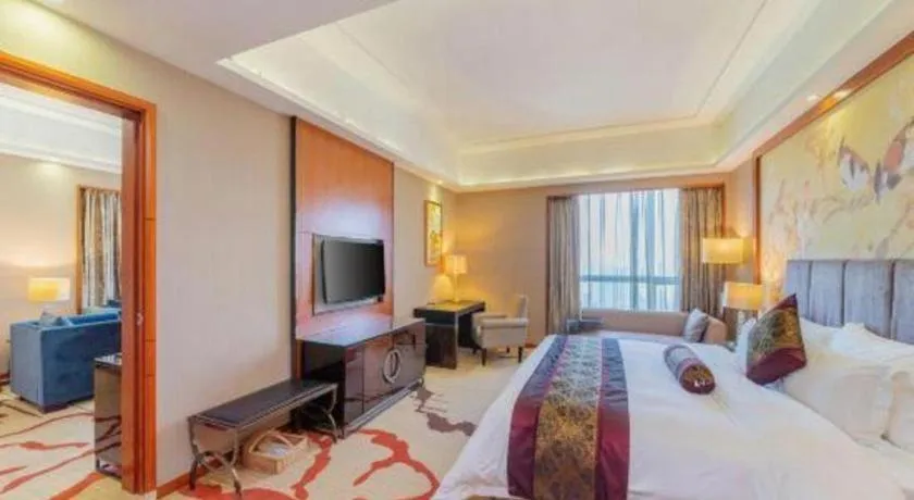 Bed in Yihao International Hotel