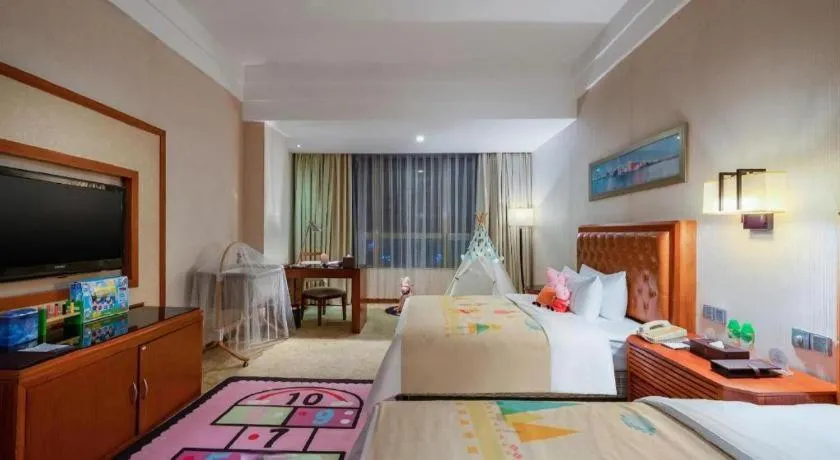 Bed in Yihao International Hotel