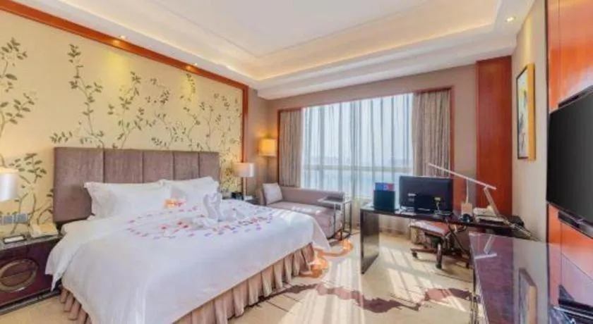 Bed in Yihao International Hotel