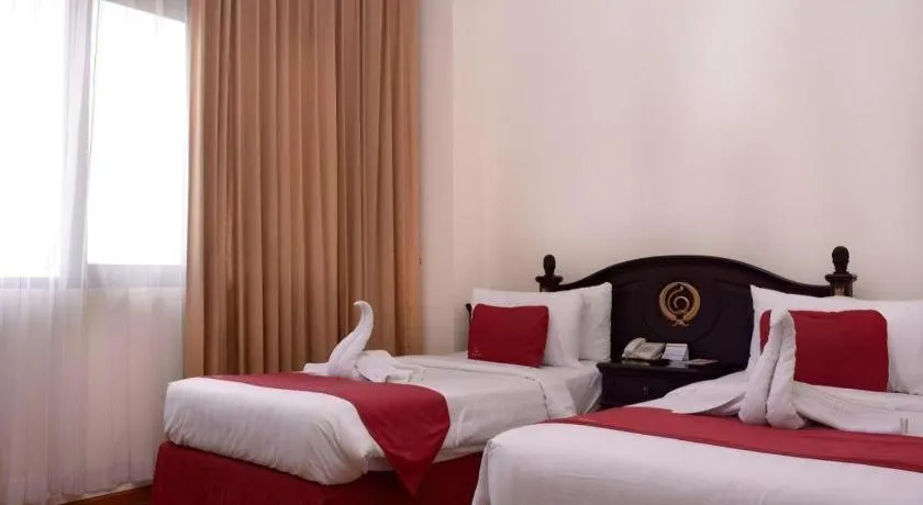 Bed in Quds Royal Hotel