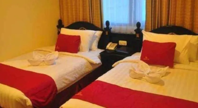 Bed in Quds Royal Hotel