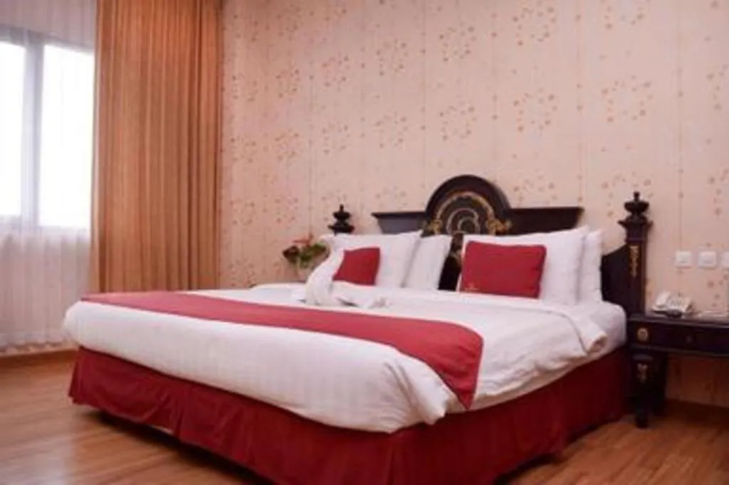 Bed in Quds Royal Hotel