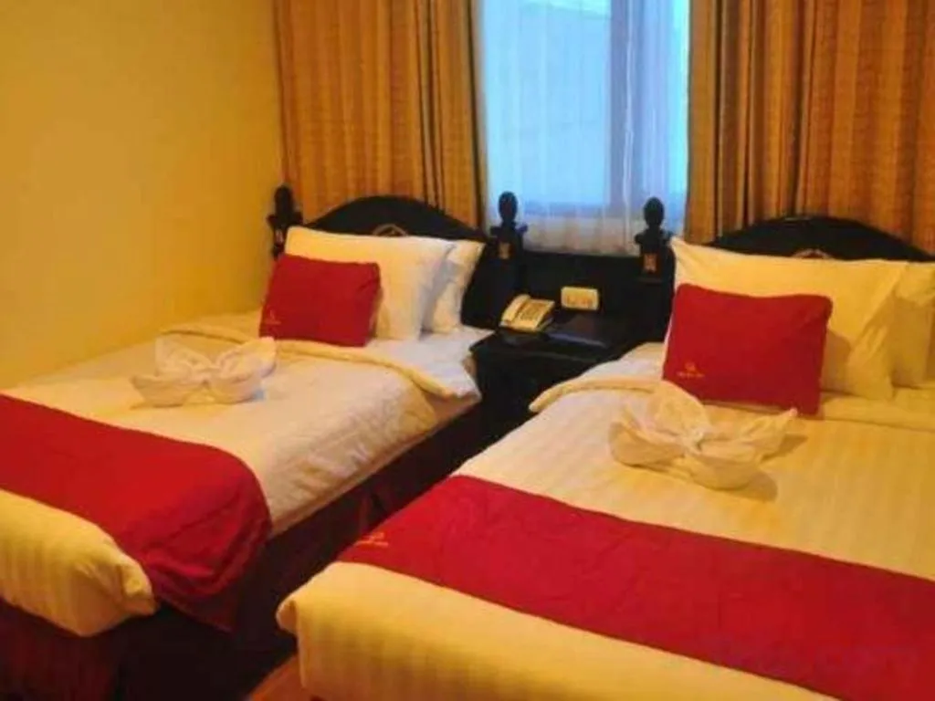 Bed in Quds Royal Hotel