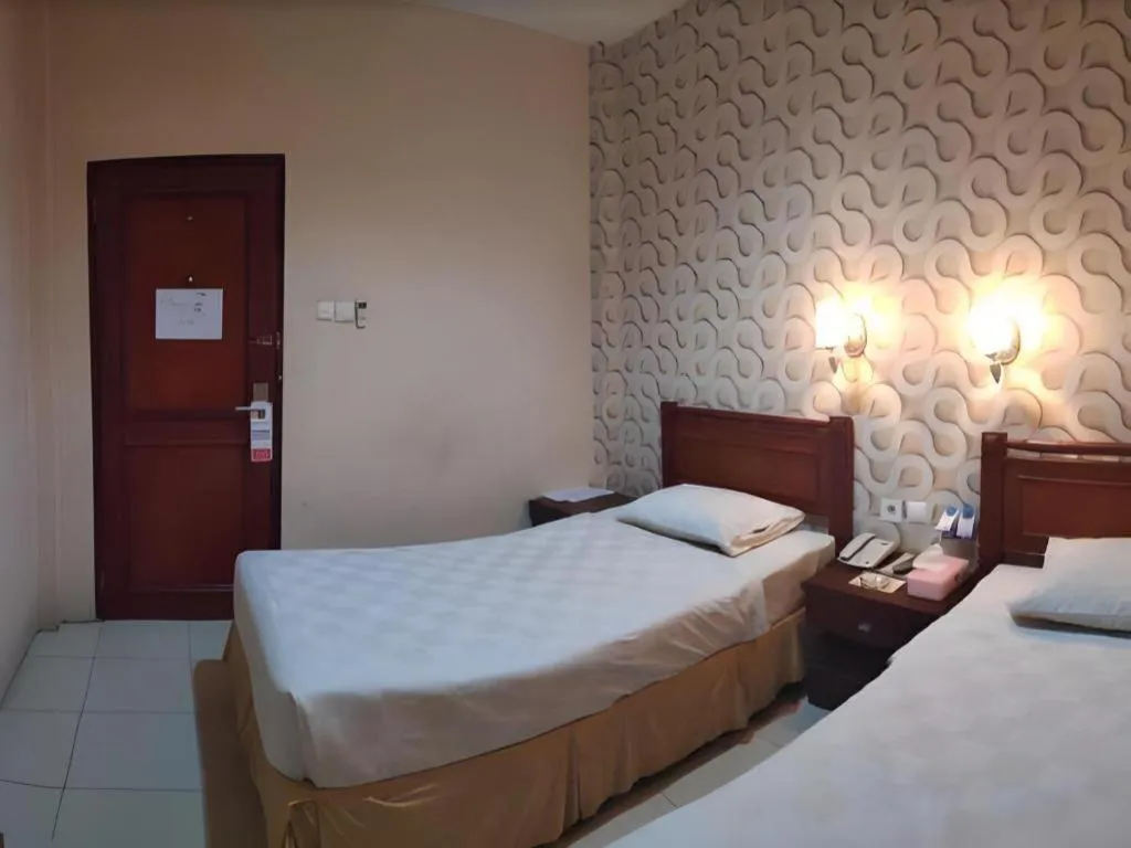 Bed in Jelita Tanjung Hotel