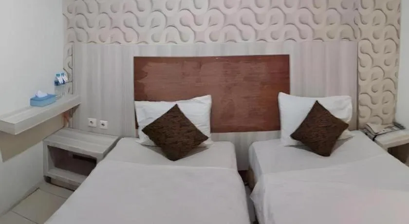 Bed in Jelita Tanjung Hotel